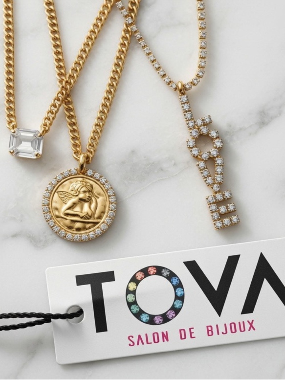 Tova Pendant stack- get the look 
Gold Angel Medallion, Rubin Love necklace Set